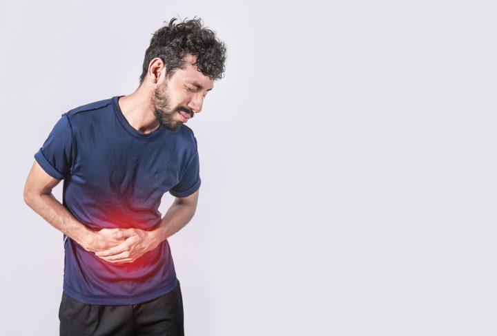 person with stomach pain, stomach problems concept, man with digestive problems, man with stomach pain, isolated